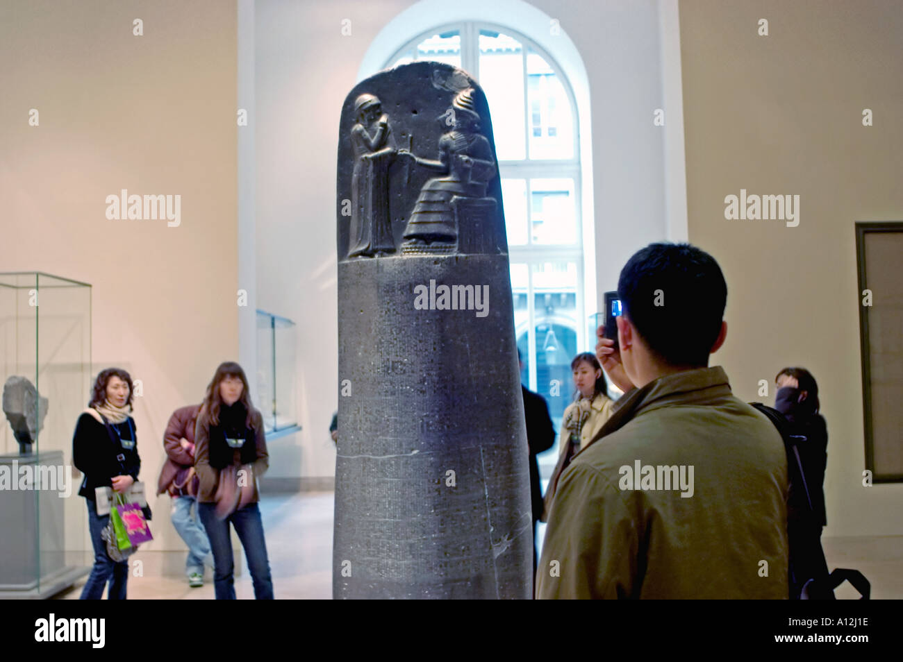 Paris France, Small Group People, Chinese Tourists Visiting "Louvre Museum" "The Code of Hammurai" from Mesopotamia Photographing Artwork, ancient c [SPEA12J1E]