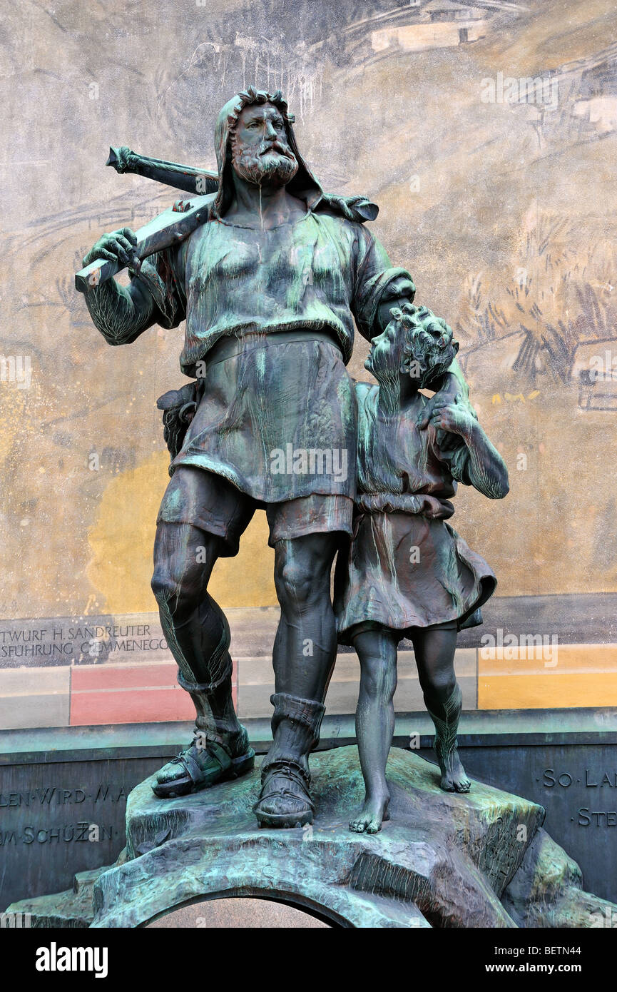 Statue of Swiss medieval folk hero William Tell / Wilhelm Tell with son and crossbow in the city Altdorf, Uri, Switzerland [SPEBETN44]